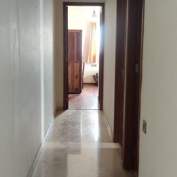 Rent a Comfortable 2BHK Semi-Furnished Flat in omkar alta monte Goregaon east-5