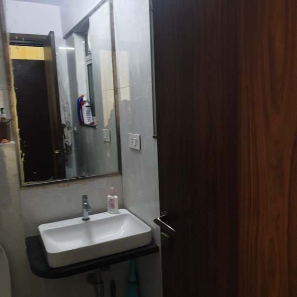 Rent a Comfortable 2BHK Semi-Furnished Flat in Omkar Ananta, Goregaon East - Ideal Living Spaces Await!-10