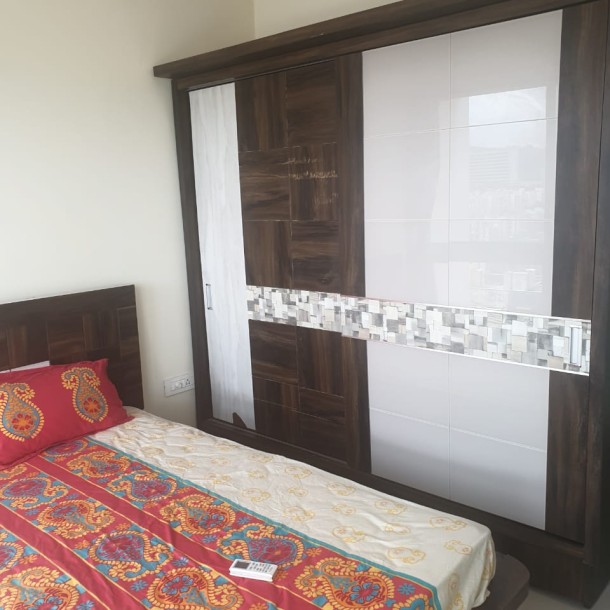 Rent a Comfortable 2BHK Semi-Furnished Flat in Omkar Ananta, Goregaon East - Ideal Living Spaces Await!-16