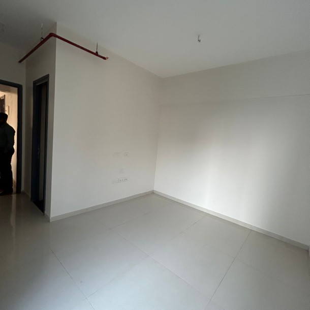 Rent a Comfortable 2BHK Semi-Furnished Flat in Rustomjee Summit-3