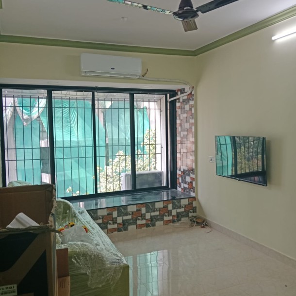 Rent a Comfortable 1BHK Semi-Furnished Flat in  Kshitij CHS-8