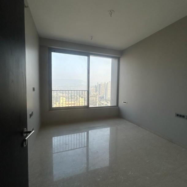 Rent a Comfortable 3BHK Semi-Furnished Flat in oberoi sky city  borivali east-24