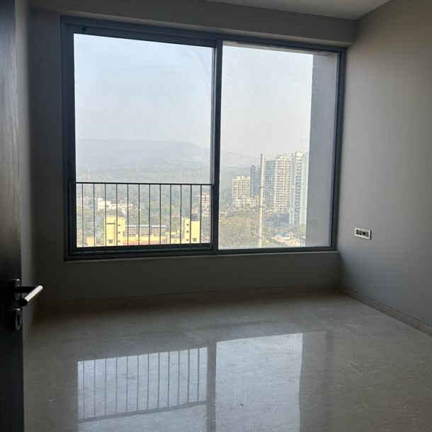Rent a Comfortable 3BHK Semi-Furnished Flat in oberoi sky city  borivali east-5