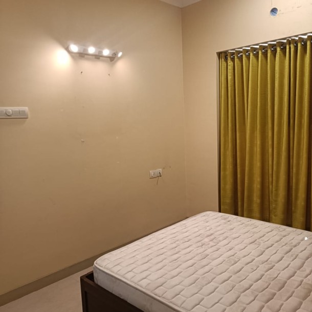 Rent a Comfortable 2BHK Semi-Furnished Flat in Raheja Residency Malad East-1