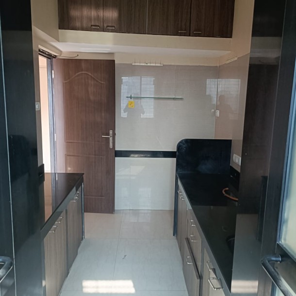 Rent a Comfortable 2BHK Semi-Furnished Flat in Raheja Residency Malad East-2