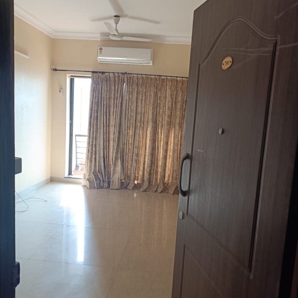 Rent a Comfortable 2BHK Semi-Furnished Flat in Raheja Residency Malad East-5