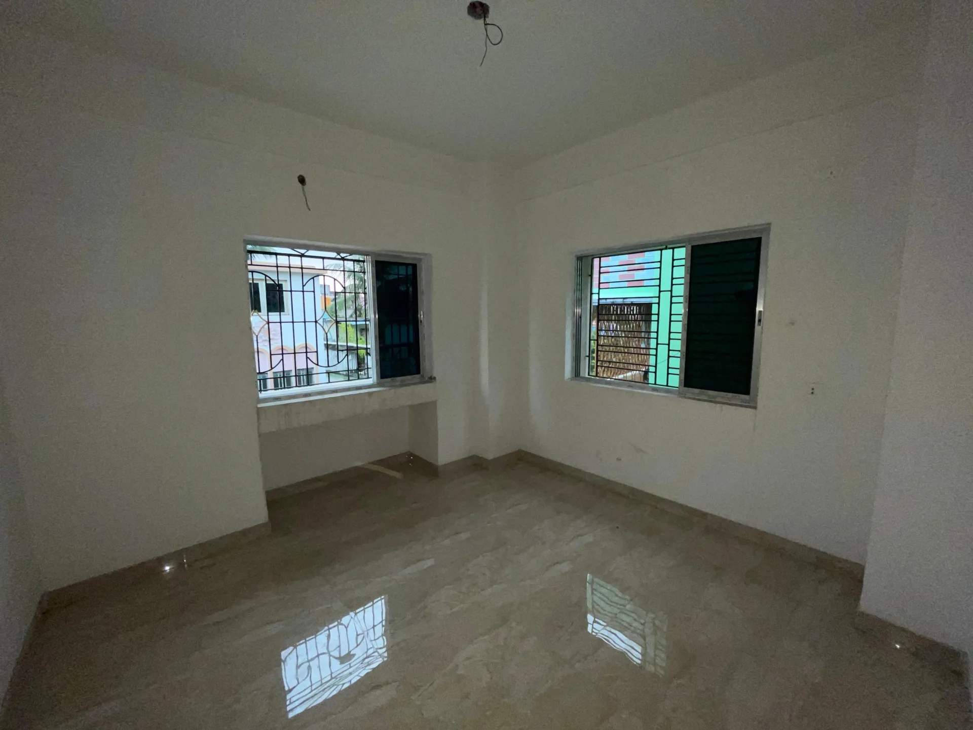 F2 BHK Flat for Sale in Baguiati | 950 Sq. Ft. | 2nd Floor | Lift Available