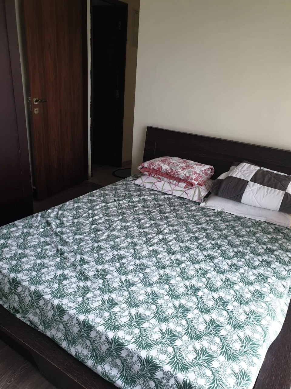 Rent a Comfortable 2BHK Semi-Furnished Flat in Omkar Ananta, Goregaon East - Ideal Living Spaces Await!