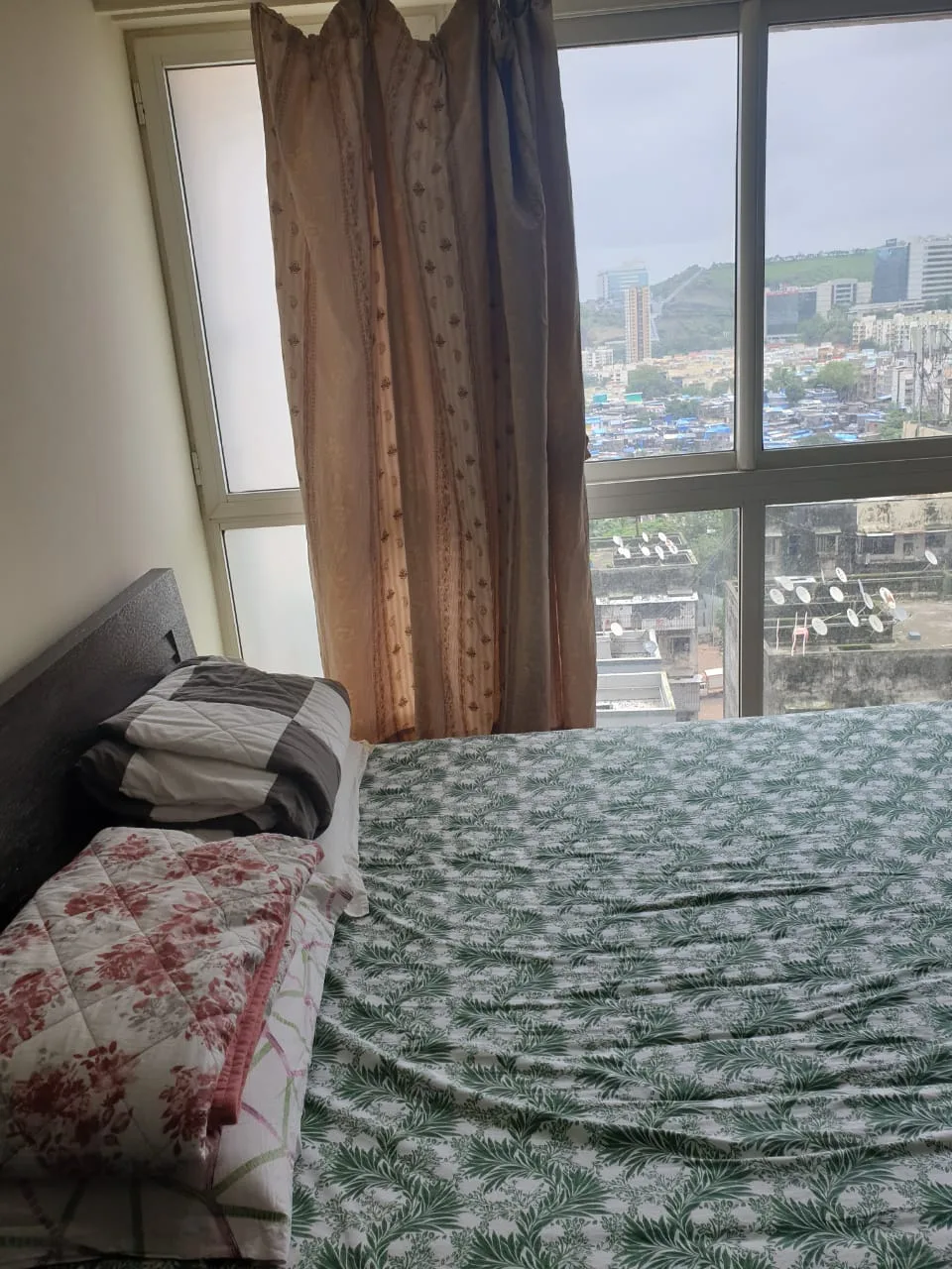 Rent a Comfortable 2BHK Semi-Furnished Flat in Omkar Ananta, Goregaon East - Ideal Living Spaces Await!
