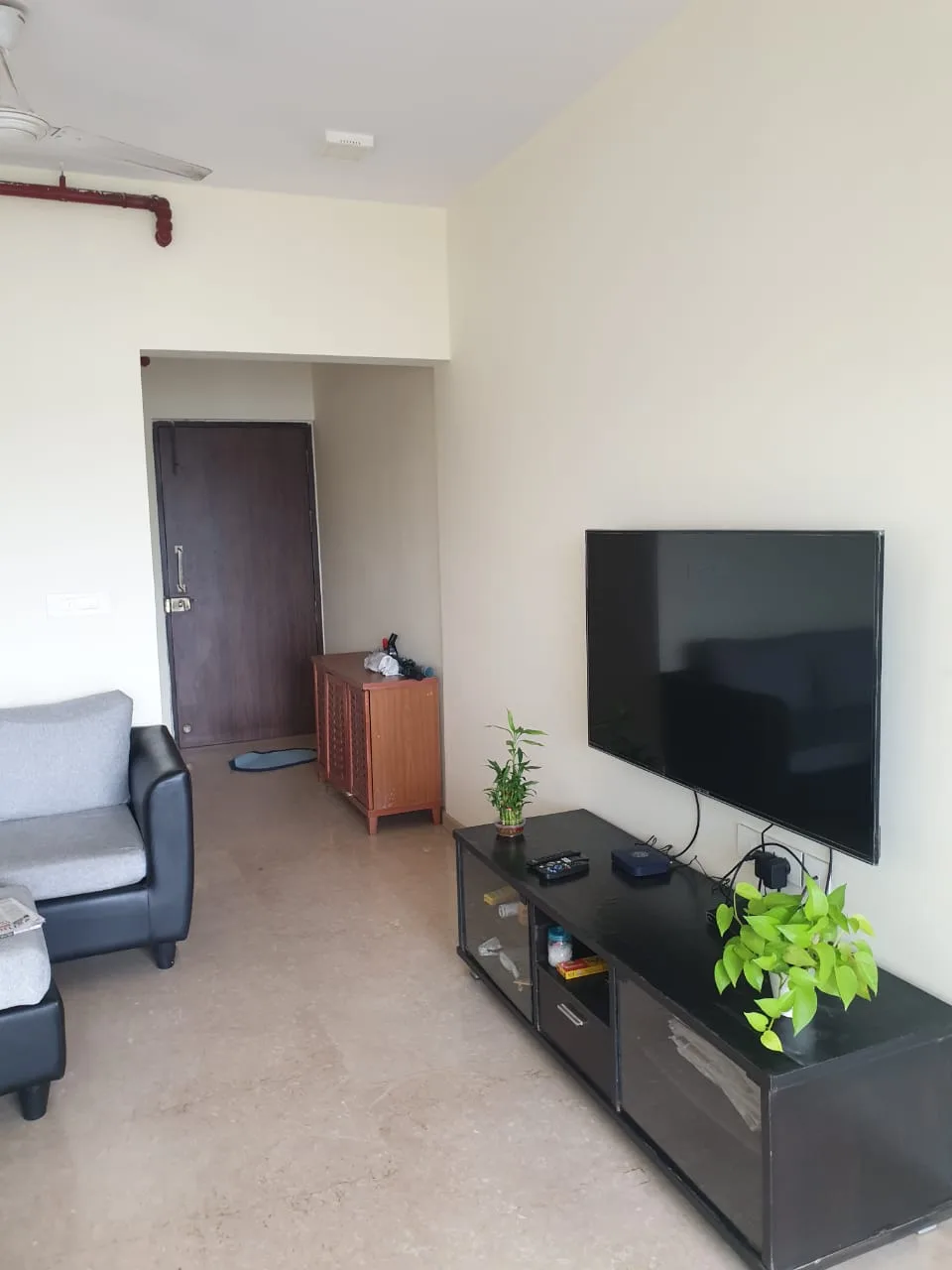 Rent a Comfortable 2BHK Semi-Furnished Flat in Omkar Ananta, Goregaon East - Ideal Living Spaces Await!