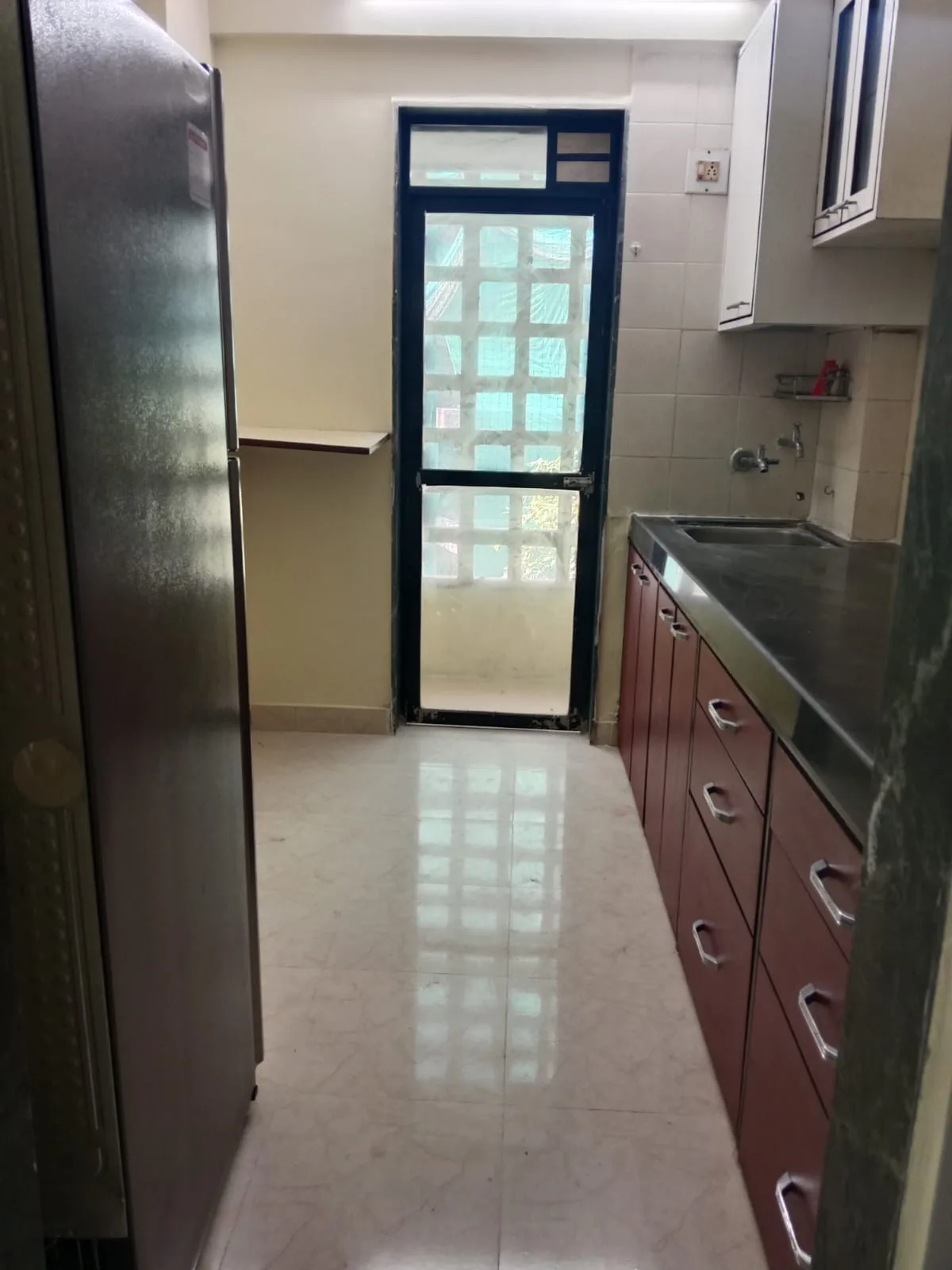 Rent a Comfortable 1BHK Semi-Furnished Flat in Kshitij CHS