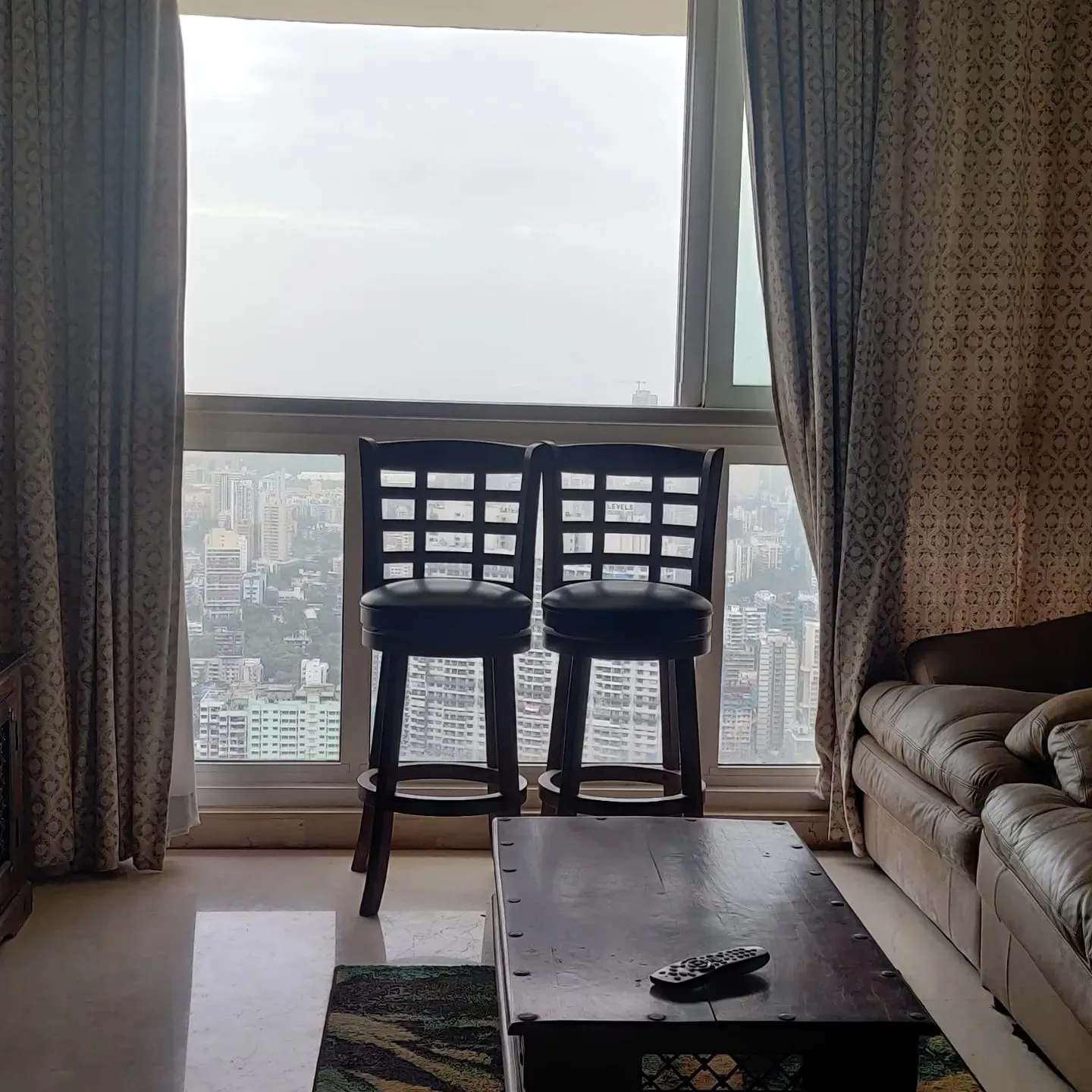 Rent a Comfortable 2BHK Semi-Furnished Flat in omkar alta monte Goregaon east